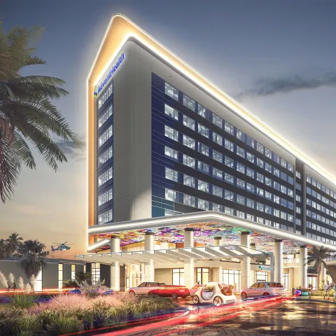 A rendered image of the AdventHealth Lake Nona building at sunset.